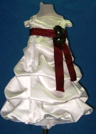 Light ivory dress with merlot sash and forest green flowers